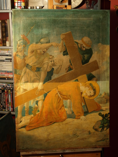 Partially cleaned Station of the Cross.