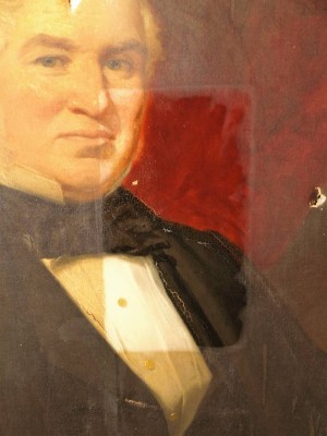 Detail of cleaning to 19th Century portrait.